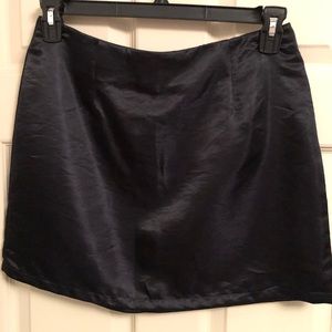 Black satin mini skirt